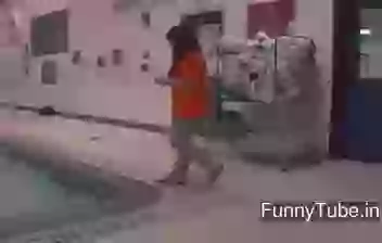 Funny girl with mobile in swimming pool gif