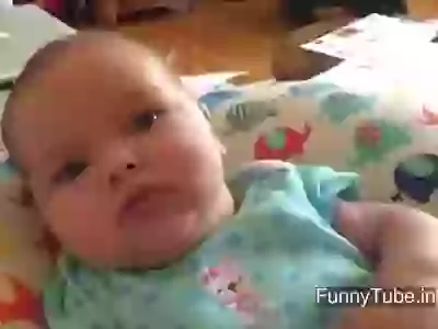 Funny reaction of a kid when mom sings