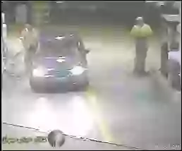 MAD CAR DRIVER AT PUMP